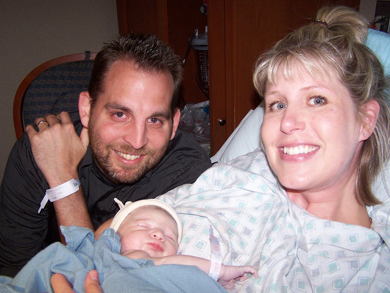 Jason Schoellen with his wife and newborn daughter
